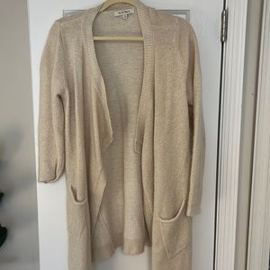 Beige cardigan with gold accents